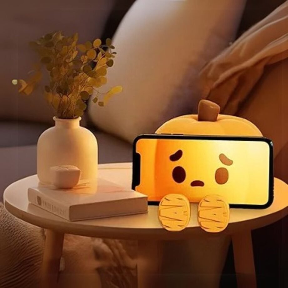 UoQo Silicone Pumpkin Night Light Cute Sad Silicone Little Pumpkin Sleep Lamp Tap to Adjust Brightness Squishy Light Up Pumpkin Phone Holder for Christmas Desk Home Decor Gifts